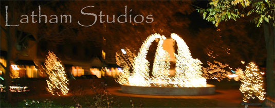Holiday lights decorating the historic Hyde Park square in front of the Miller Gallery in Cincinnati, Ohio where Rebecca Latham and her family (Karen & Bonnie Latham) are showing miniature paintings for the holidays.