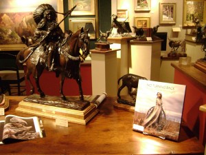 Photo Credit: Whistle Pik Galleries. Veryl Goodnight bronze and book Sandy Scott bronze whistlepik 300x225 God Bless America Show